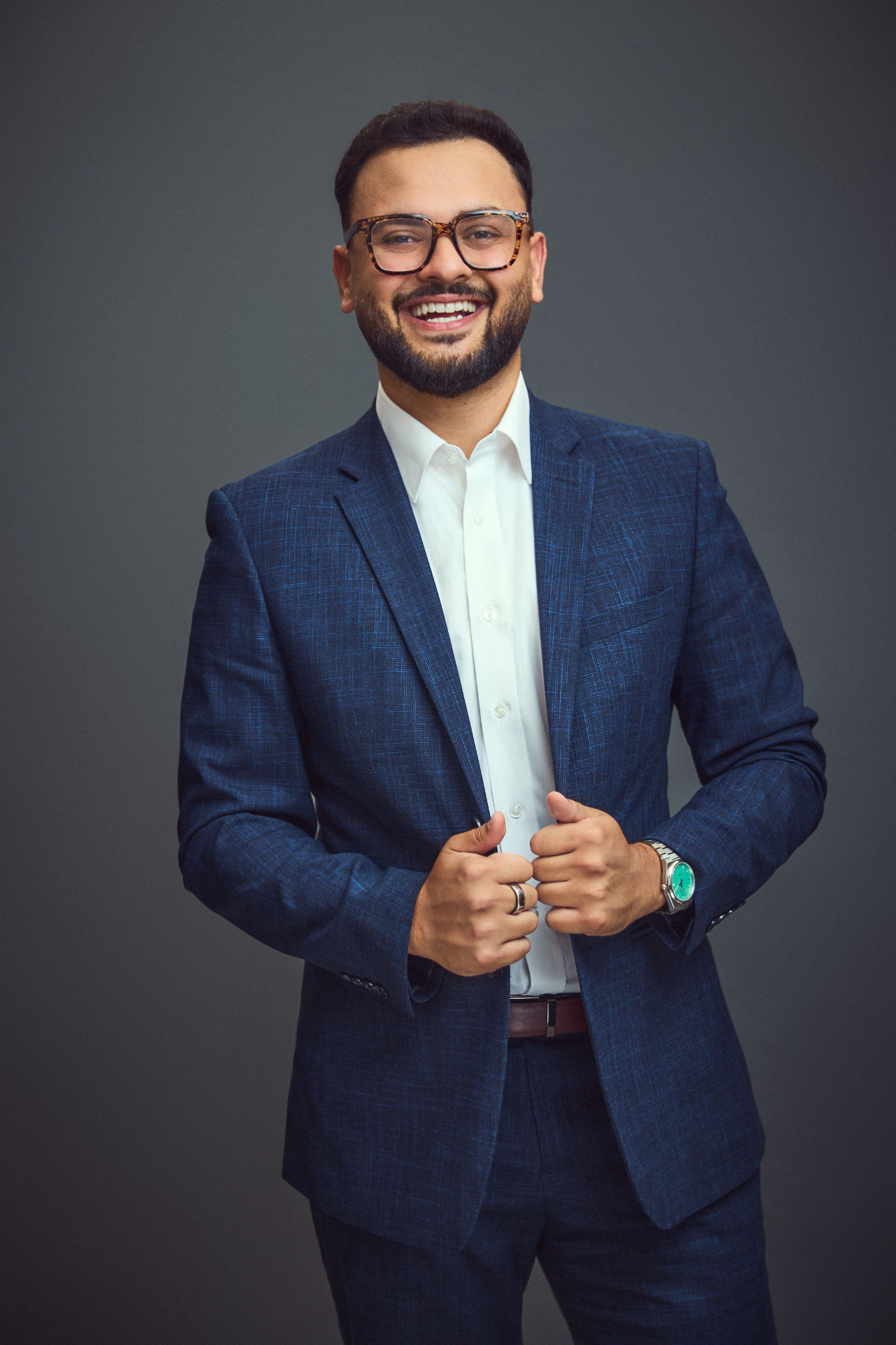 Professional headshot of Syed Naqvi